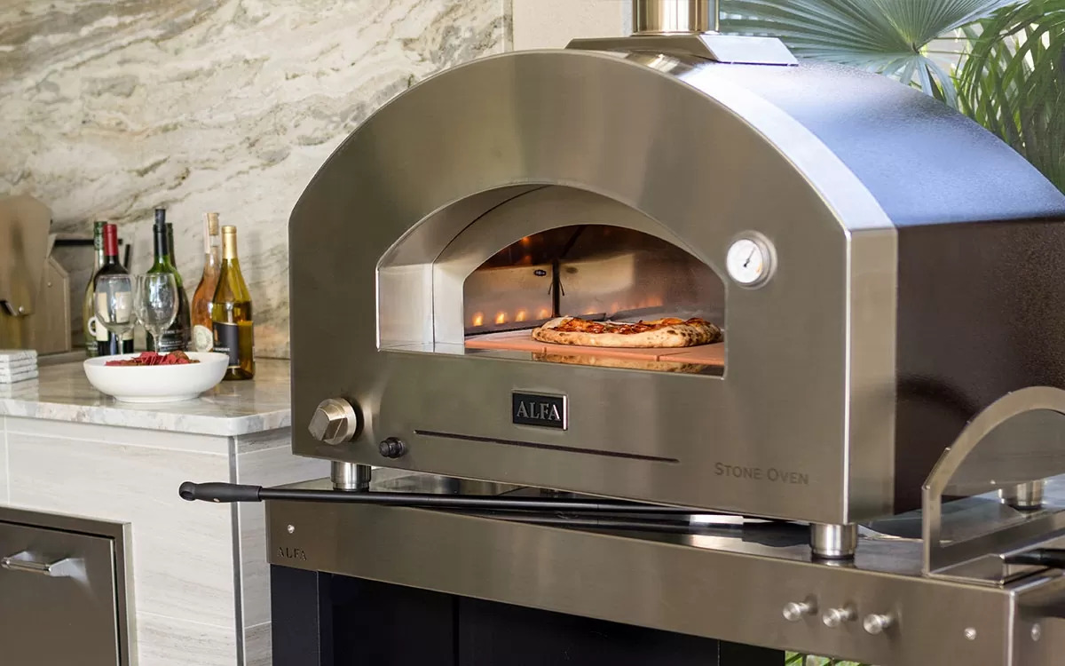 https://grillbilliesbarbecue.com/wp-content/uploads/2023/02/Alfa_Stone_Oven_Gas_or_Wood_Fired_Pizza_Oven_Lifestyle_02.jpg